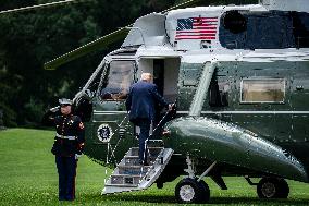 US President Donald Trump boards Marine One