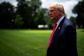 US President Donald Trump boards Marine One