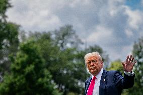 US President Donald Trump boards Marine One