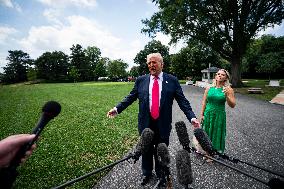 US President Donald Trump boards Marine One