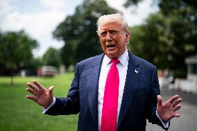 US President Donald Trump boards Marine One