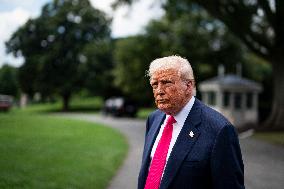 US President Donald Trump boards Marine One