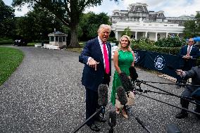 US President Donald Trump boards Marine One