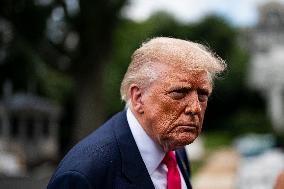 US President Donald Trump boards Marine One