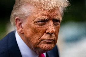 US President Donald Trump boards Marine One