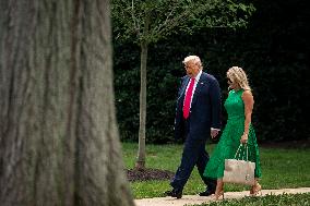 US President Donald Trump boards Marine One