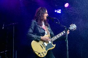 LAURA COX
