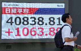 Tokyo stocks surge