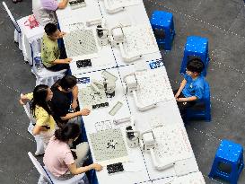 AI Robots Play Chess With Humans