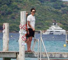 Adrien Brody and Georgina Chapman at Club 55 in Saint-Tropez - France
