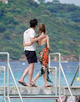 Adrien Brody and Georgina Chapman at Club 55 in Saint-Tropez - France