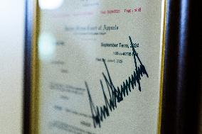 Trump-Signed Court Order Allowing Ban of Associated Press from Pool Displayed in Press Briefing Room of White House