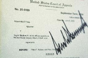 Trump-Signed Court Order Allowing Ban of Associated Press from Pool Displayed in Press Briefing Room of White House