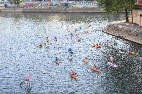 elebrations marking the first anniversary of the Paris 2024 Olympic Games - Canoes Parade