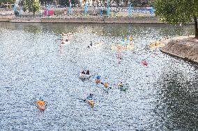 elebrations marking the first anniversary of the Paris 2024 Olympic Games - Canoes Parade