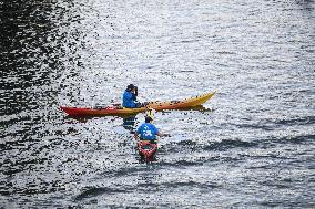 elebrations marking the first anniversary of the Paris 2024 Olympic Games - Canoes Parade