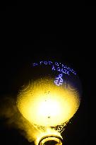 Amnesty International Action - "Stop genocide in Gaza" onto the Paris 2024 Olympic cauldron - Paris