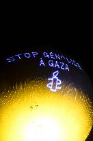 Amnesty International Action - "Stop genocide in Gaza" onto the Paris 2024 Olympic cauldron - Paris