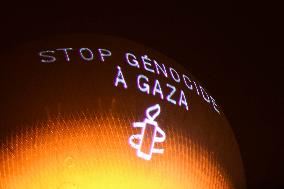 Amnesty International Action - "Stop genocide in Gaza" onto the Paris 2024 Olympic cauldron - Paris