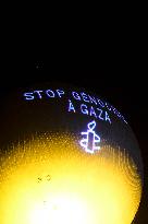 Amnesty International Action - "Stop genocide in Gaza" onto the Paris 2024 Olympic cauldron - Paris