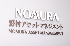 Nomura Asset Management signboard and logo