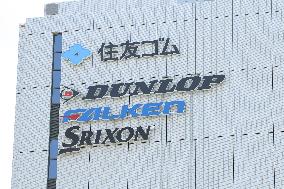 Sumitomo Rubber, Dunlop, Falken, and Srixon signs and logos