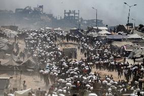 Palestinians Carry Flour As Humanitarian Aid Reaches Gaza