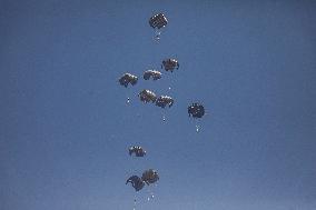 Military Aircraft Drops Humanitarian Aid on Northern Gaza