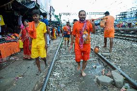 Devotees Carry Ganga Water in Pilgrimage - India