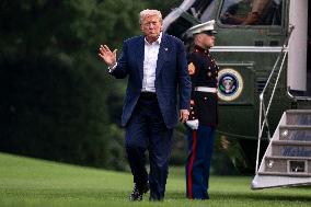 President Donald Trump Returns to the White House from United Kingdom Trip