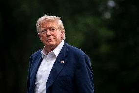 President Donald Trump Returns to the White House from United Kingdom Trip