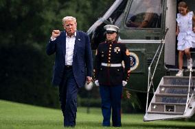 President Donald Trump Returns to the White House from United Kingdom Trip