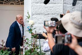 President Donald Trump Returns to the White House from United Kingdom Trip