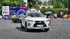 L4-level AI Autonomous Driving Car Experience Event at the 2025 WAIC in Shanghai