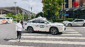L4-level AI Autonomous Driving Car Experience Event at the 2025 WAIC in Shanghai