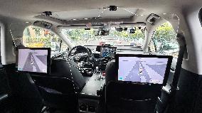 L4-level AI Autonomous Driving Car Experience Event at the 2025 WAIC in Shanghai