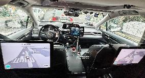 L4-level AI Autonomous Driving Car Experience Event at the 2025 WAIC in Shanghai
