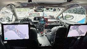 L4-level AI Autonomous Driving Car Experience Event at the 2025 WAIC in Shanghai