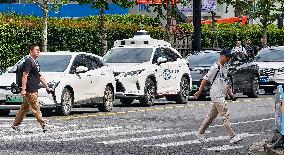 L4-level AI Autonomous Driving Car Experience Event at the 2025 WAIC in Shanghai