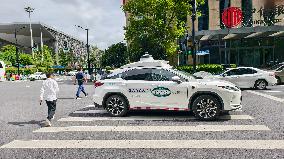 L4-level AI Autonomous Driving Car Experience Event at the 2025 WAIC in Shanghai