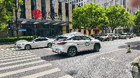 L4-level AI Autonomous Driving Car Experience Event at the 2025 WAIC in Shanghai
