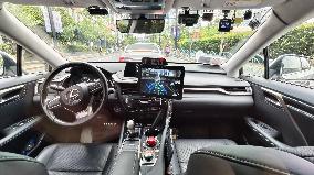 L4-level AI Autonomous Driving Car Experience Event at the 2025 WAIC in Shanghai