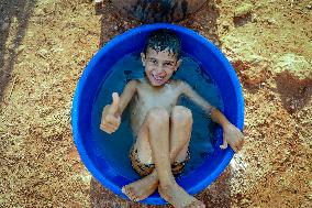 Scorching Heat Torments Displaced Families - Syria