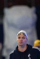Leon Marchand Breaks 200 Medley Record at Swimming World Championships - Singapore