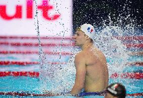 Leon Marchand Breaks 200 Medley Record at Swimming World Championships - Singapore