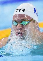 Leon Marchand Breaks 200 Medley Record at Swimming World Championships - Singapore