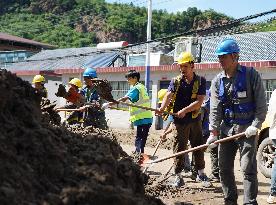 Heavy Rains Leave 30 Dead in Beijing - China