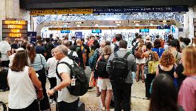 Exodus at Central Station Departures for the Summer Holidays - Milan