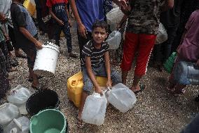 Fetching Water - Gaza City