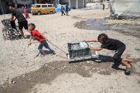 Fetching Water - Gaza City